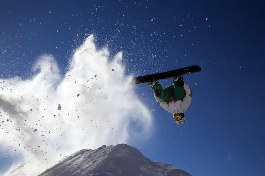Doing A Flip On A Snowboard